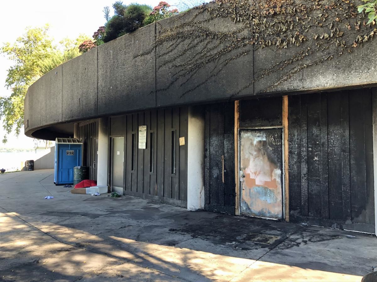 Police: man set fire to homeless peoples' tent; fire damaged park shelter